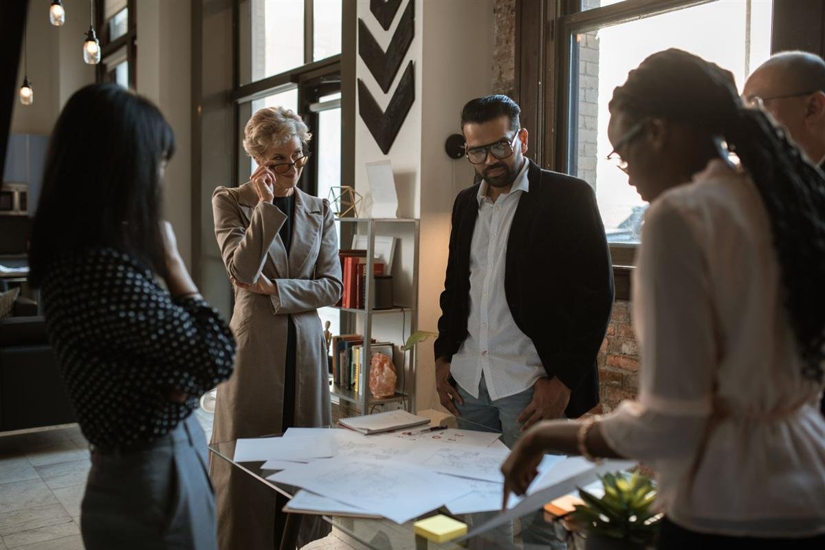 Diverse group of business professionals discussing project plans